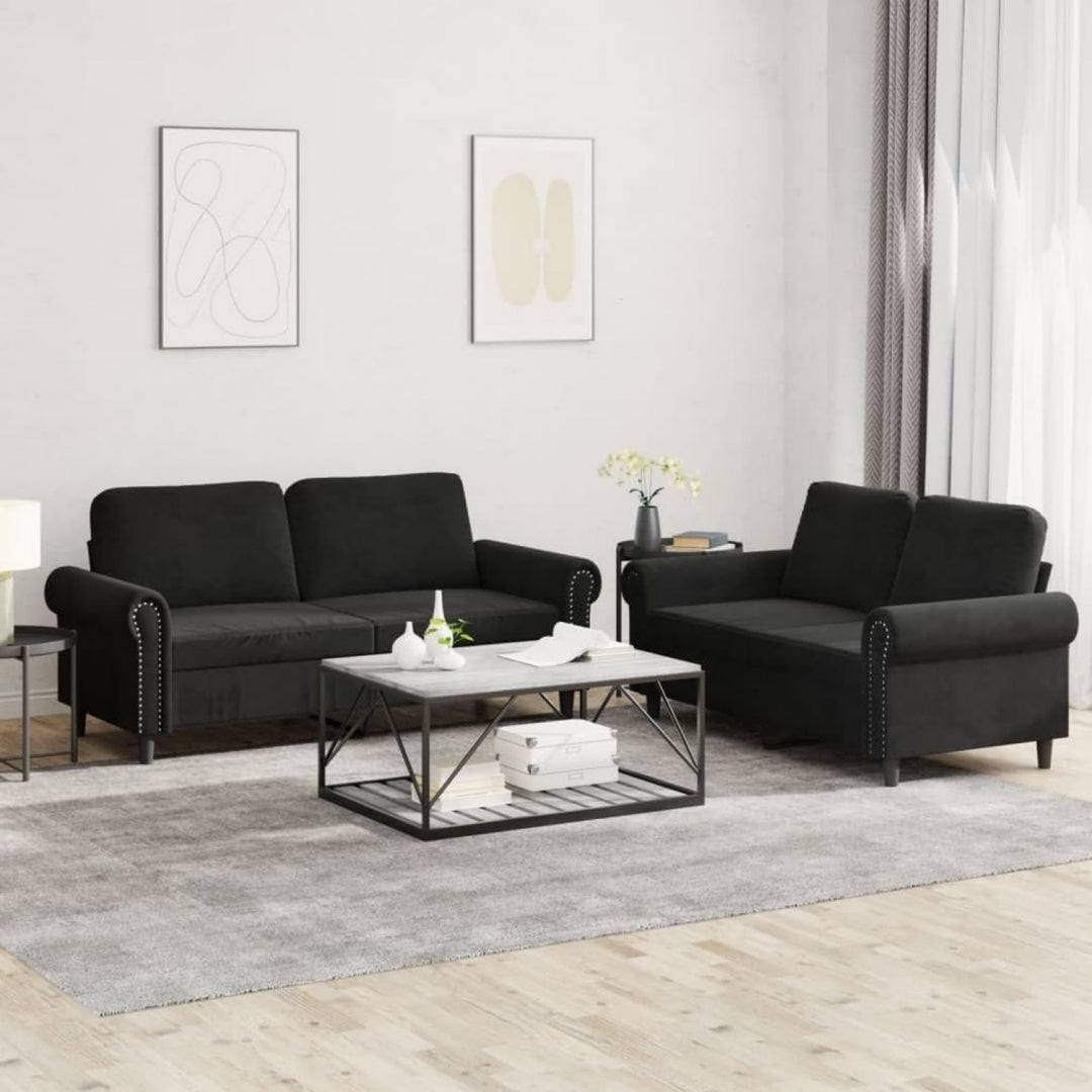 Divano confortevole nero con braccioli rivestimento in velluto